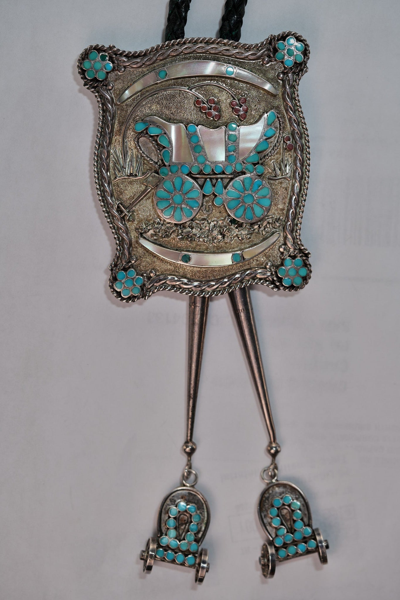 Conestoga belt buckle and bolo