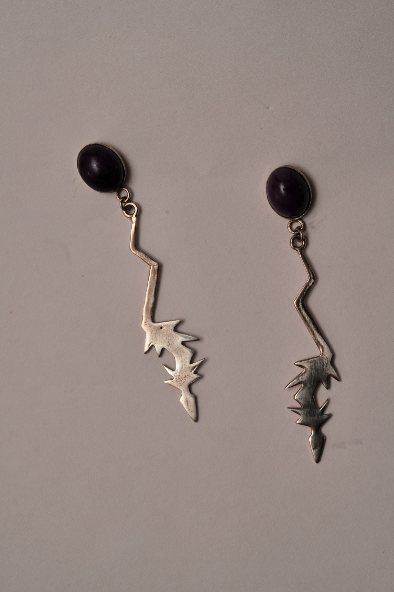 Lightening bolts with sugilitie earrings by Danny Romero