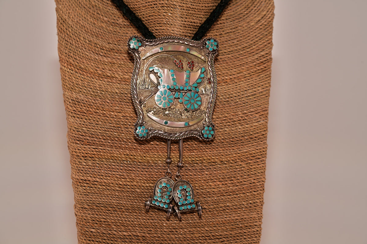 Conestoga belt buckle and bolo