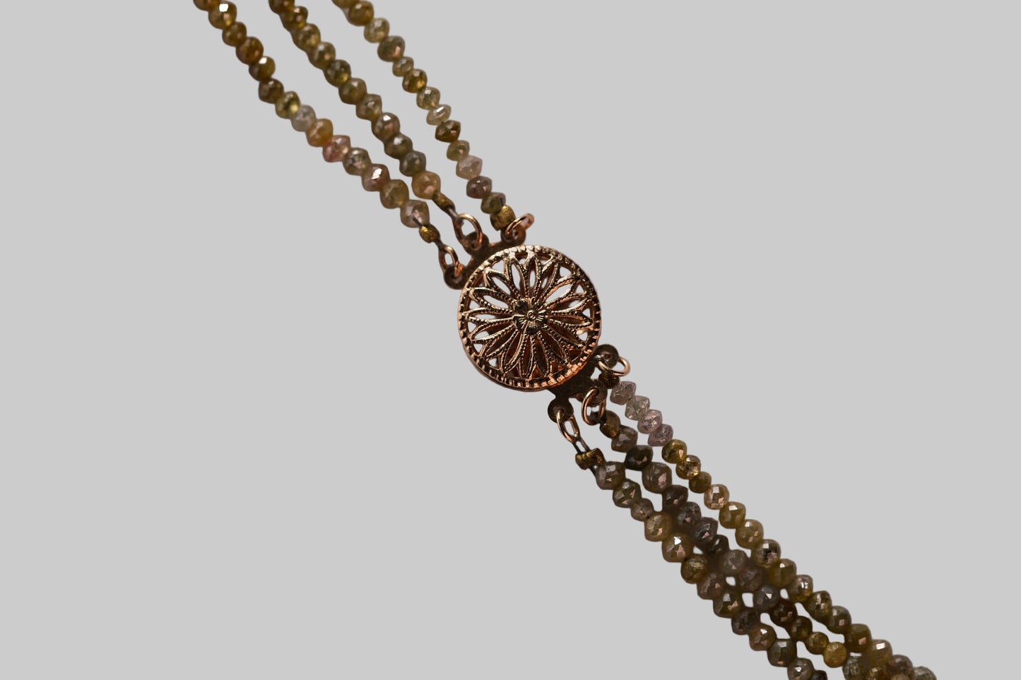 3 strand faceted colored diamonds