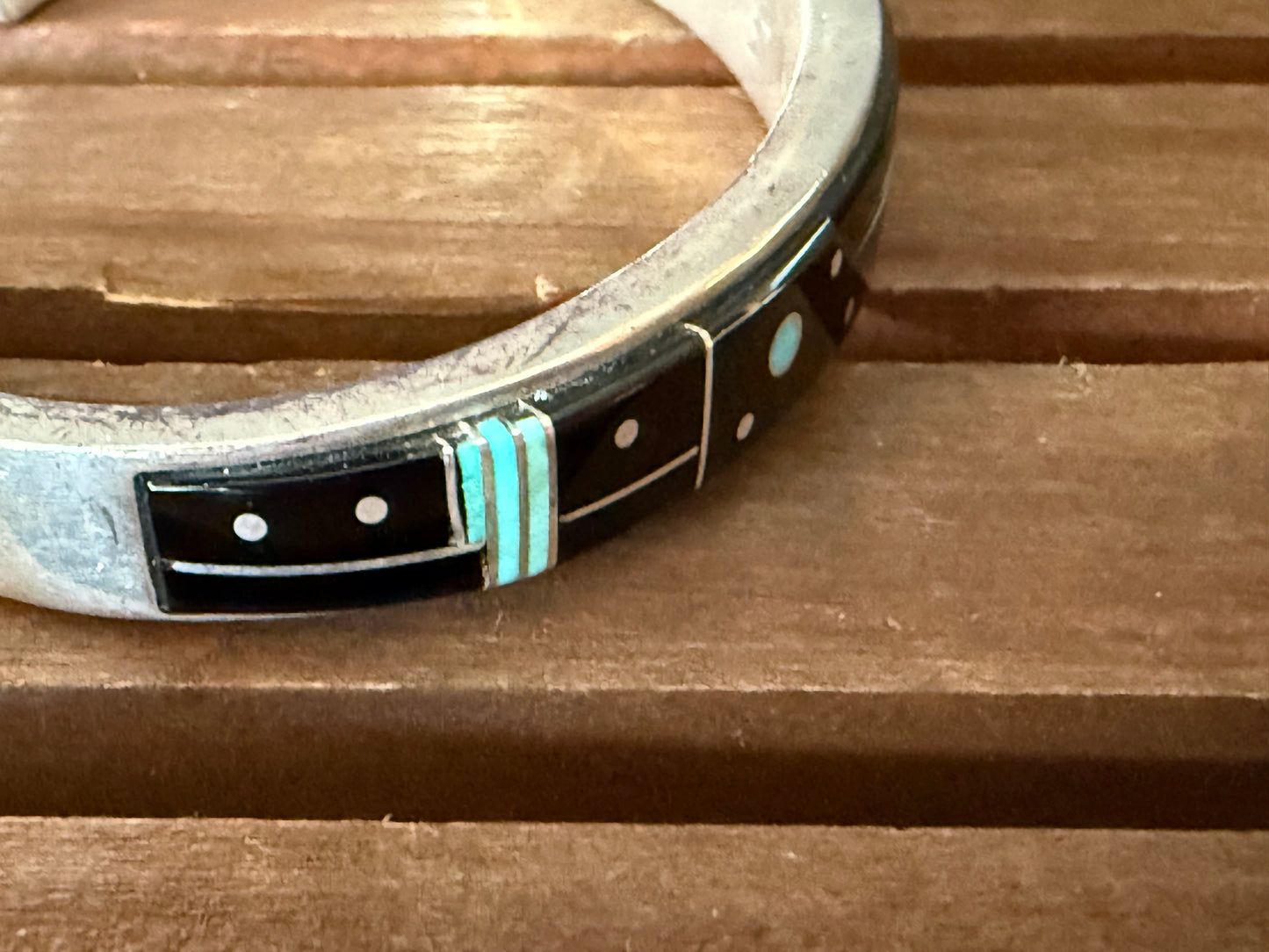 Modern surface motif with background, Calvin Begay, Navajo, handcrafted bracelet.