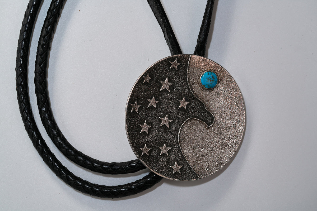 Modern sun,moon and stars bolo by Darryl Dean Begay