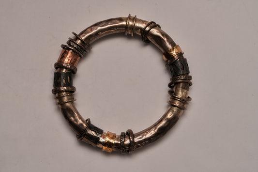 Bangle cuff of many metals