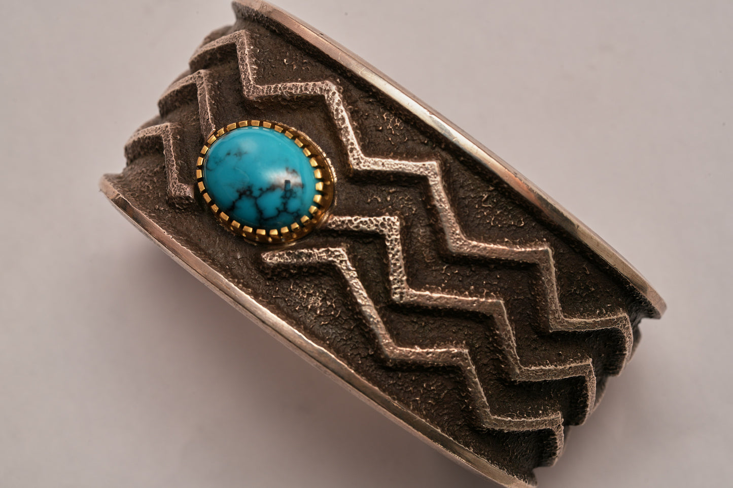 Tufa cast, 18kt,sterling silver and turquoise bracelet
