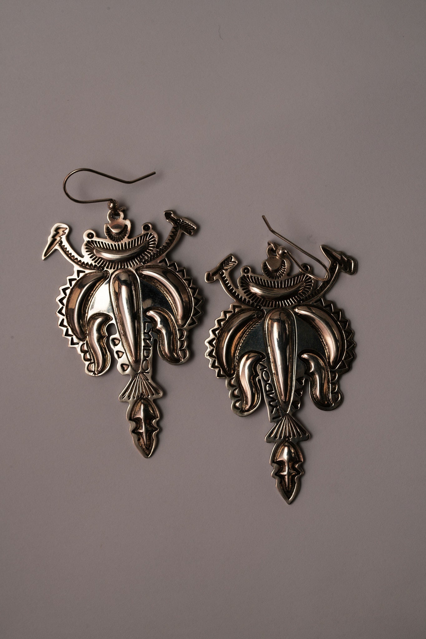 Sterling silver "insect" long dangle earring by Lyndon Tsosie