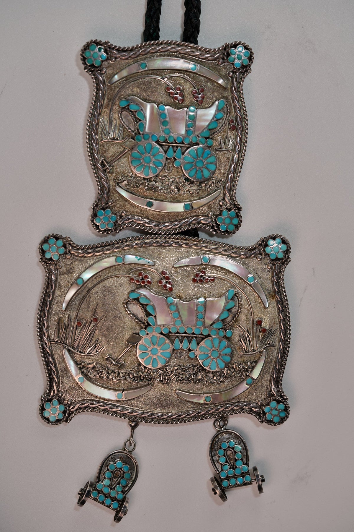 Conestoga belt buckle and bolo