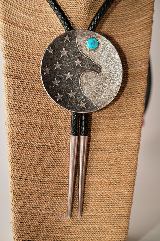 Modern sun,moon and stars bolo by Darryl Dean Begay