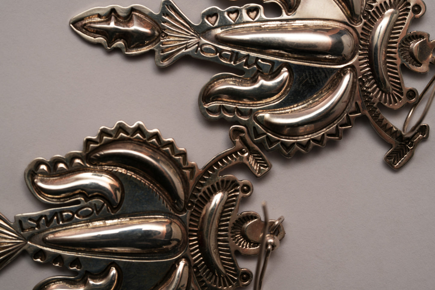 Sterling silver "insect" long dangle earring by Lyndon Tsosie