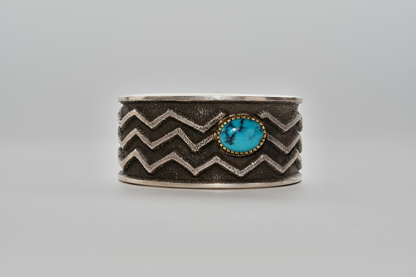 Tufa cast, 18kt,sterling silver and turquoise bracelet