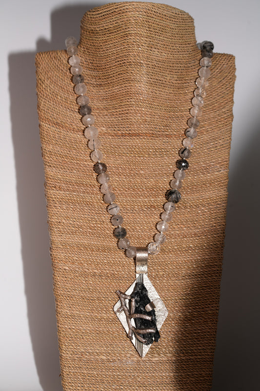 Rutiliated quartz with Kyanite pendant