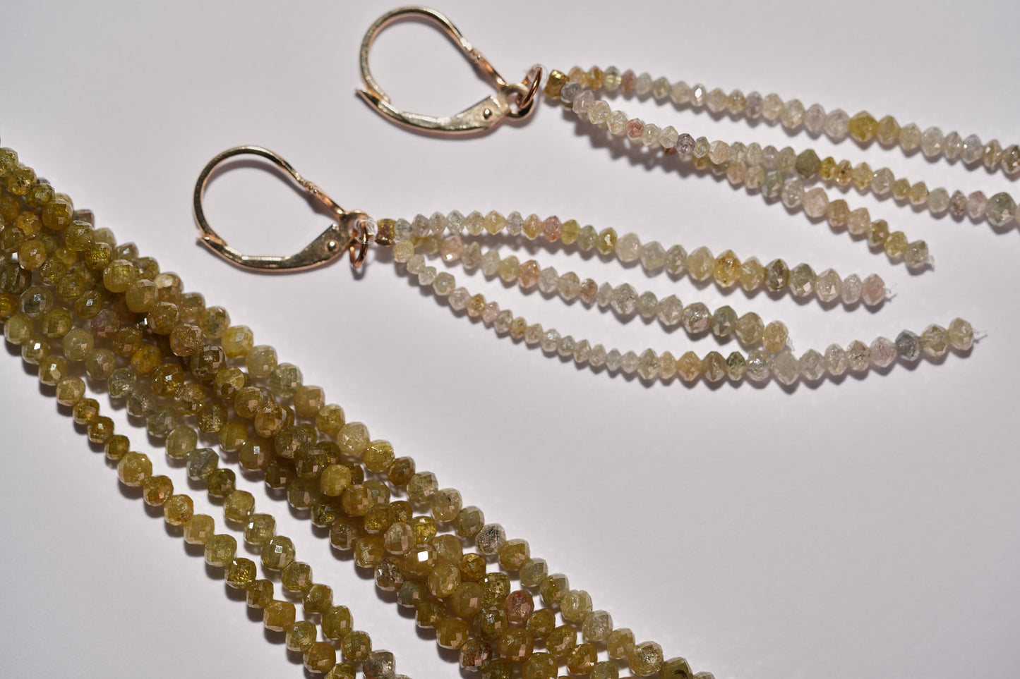 3 strand faceted colored diamonds