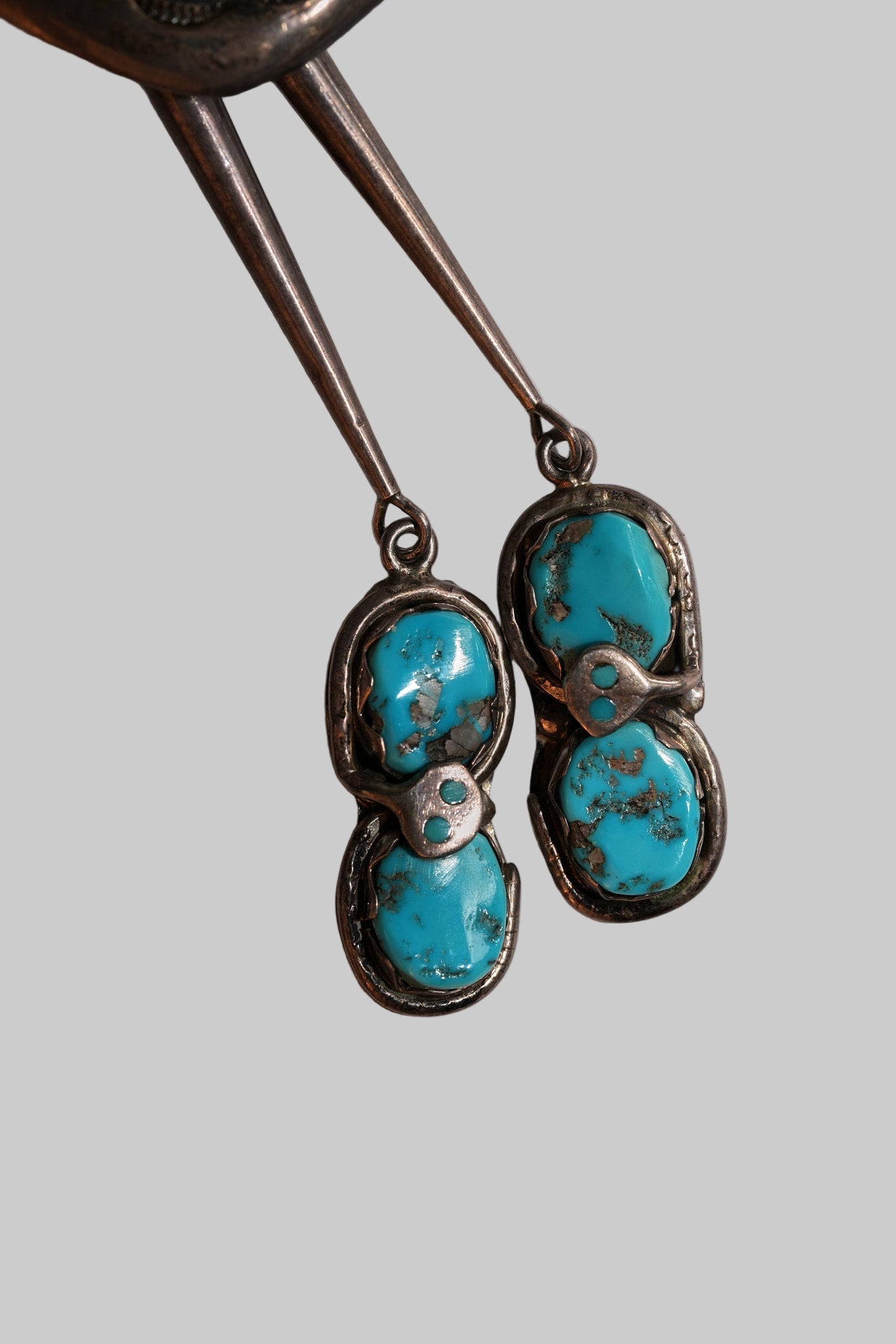 Snake bolo by Effie Calavaza, Zuni