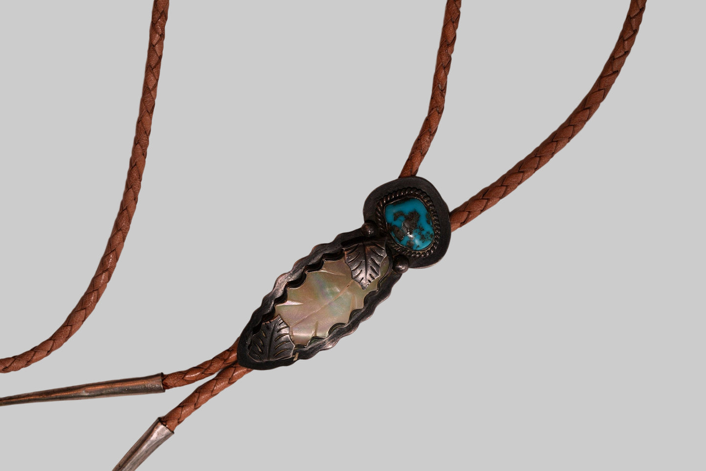 Mother of pearl and turquoise bolo by Ramon Platero