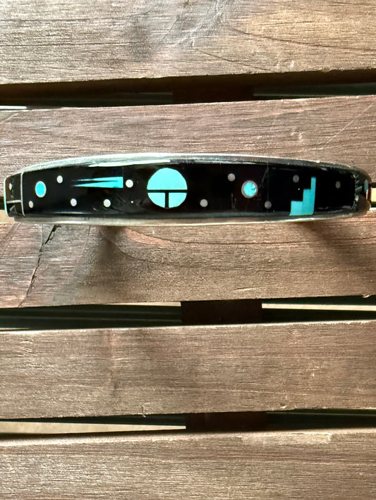 Modern surface motif with background, Calvin Begay, Navajo, handcrafted bracelet.