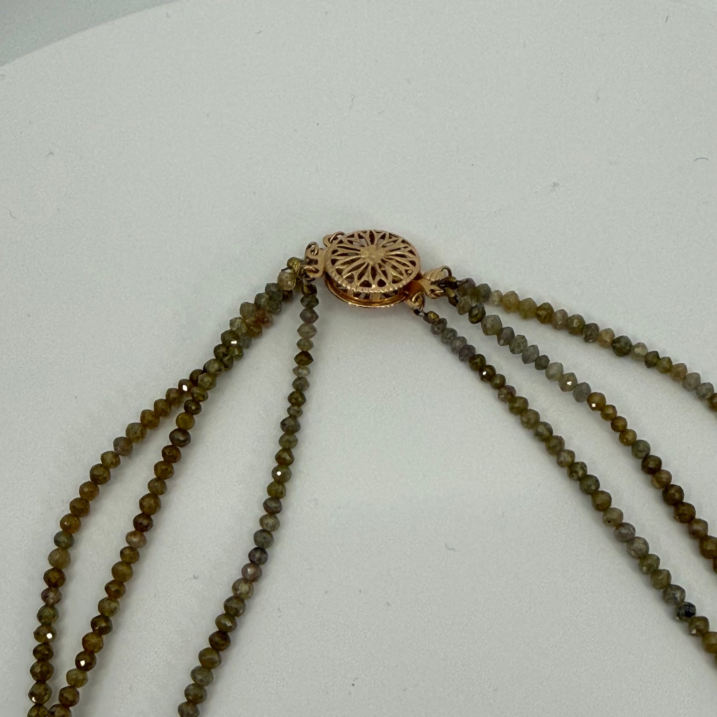3 strand faceted colored diamonds
