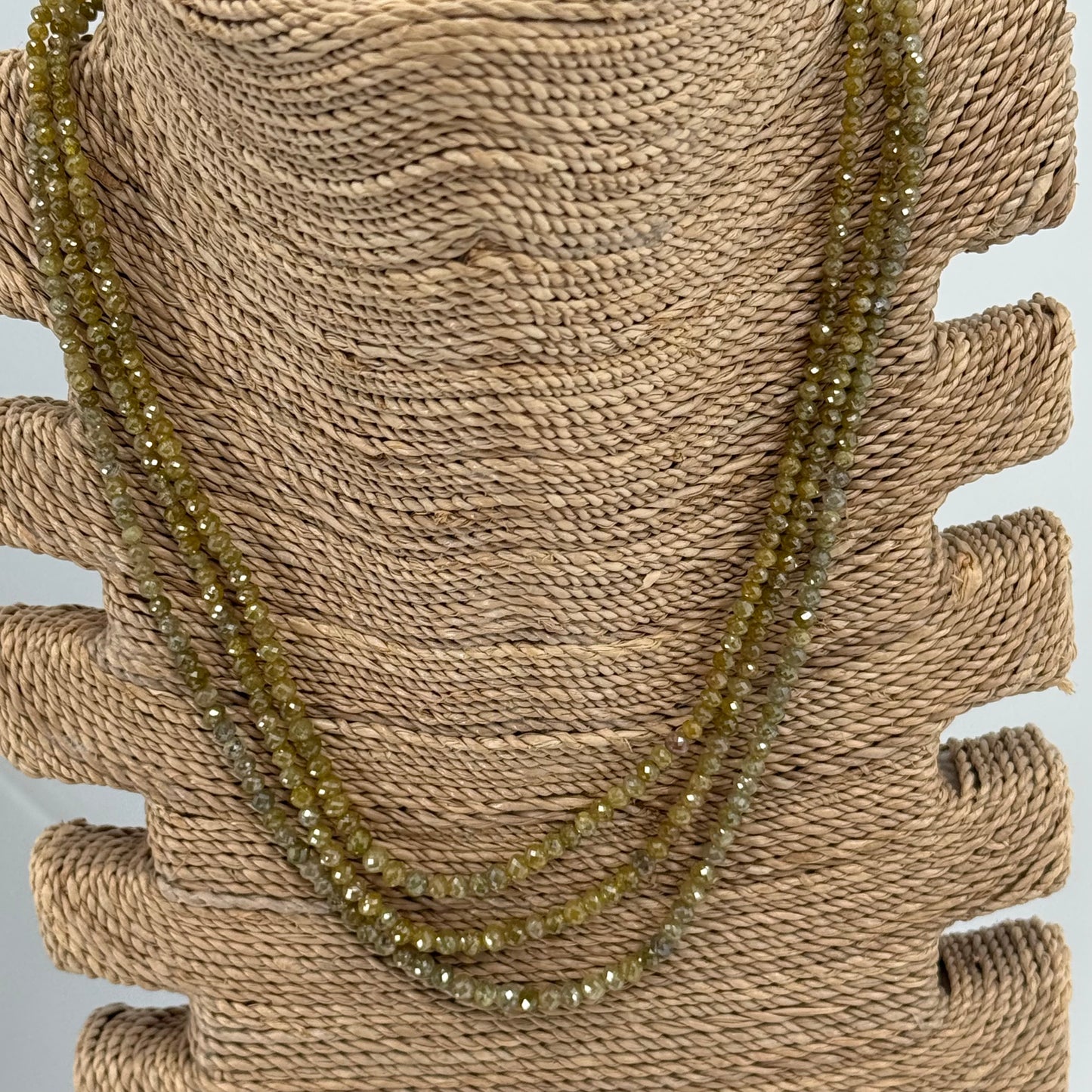 3 strand faceted colored diamonds