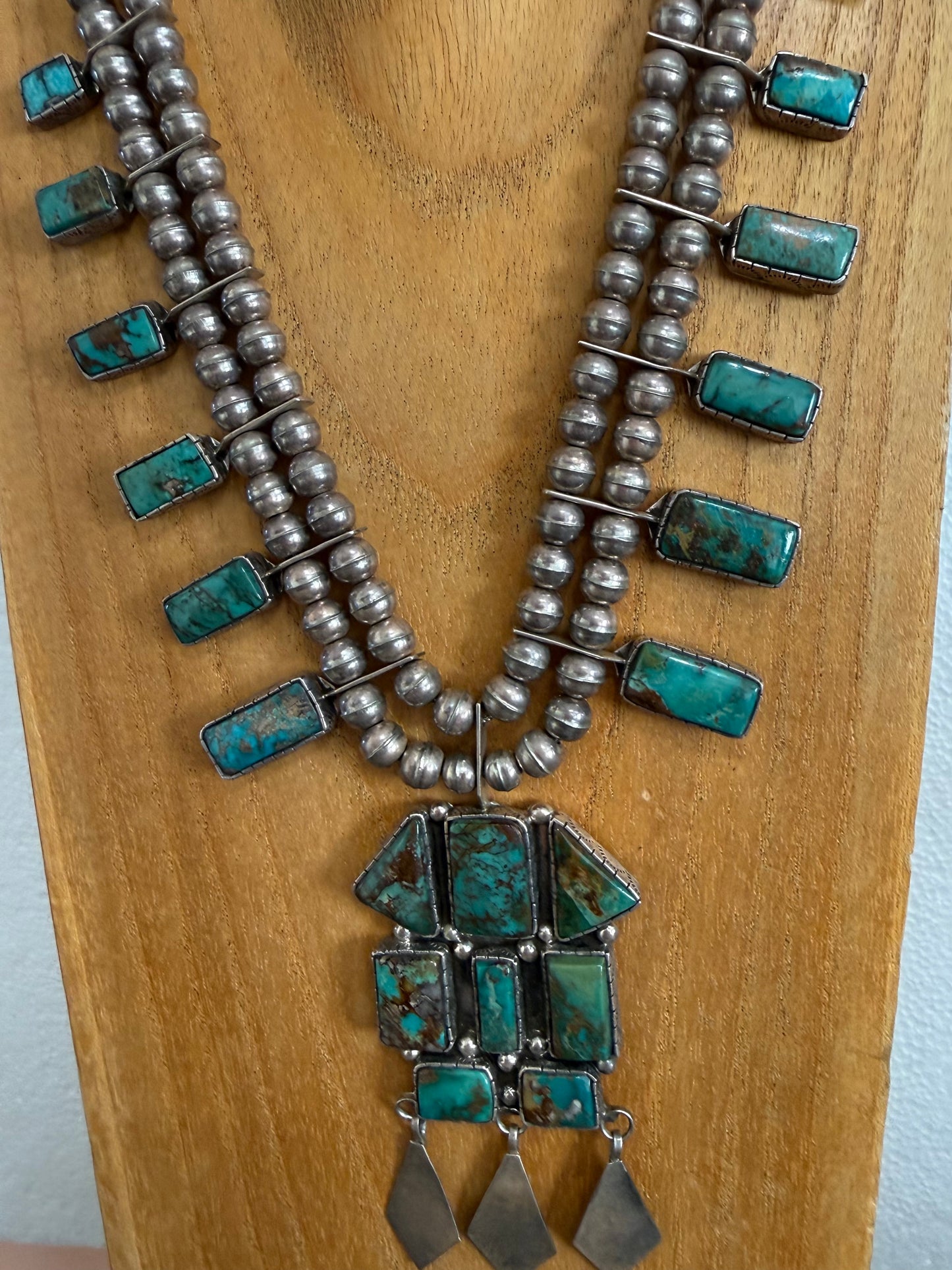 Do you know what makes a squash blossom necklace?