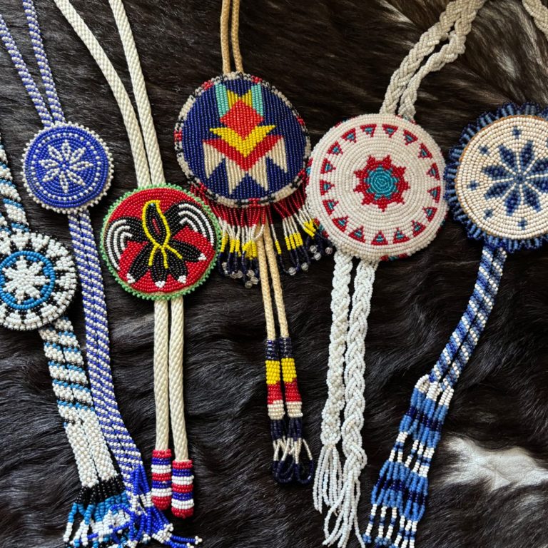 E. TSOSIE BOLO AND SAPPHIRES SAPPHIRES AND BOLO