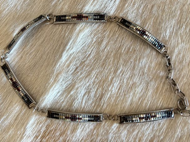 Beaded and sterling silver link necklace. Hallmarked with G. Appx 15 1/2". Can be worn as a choker